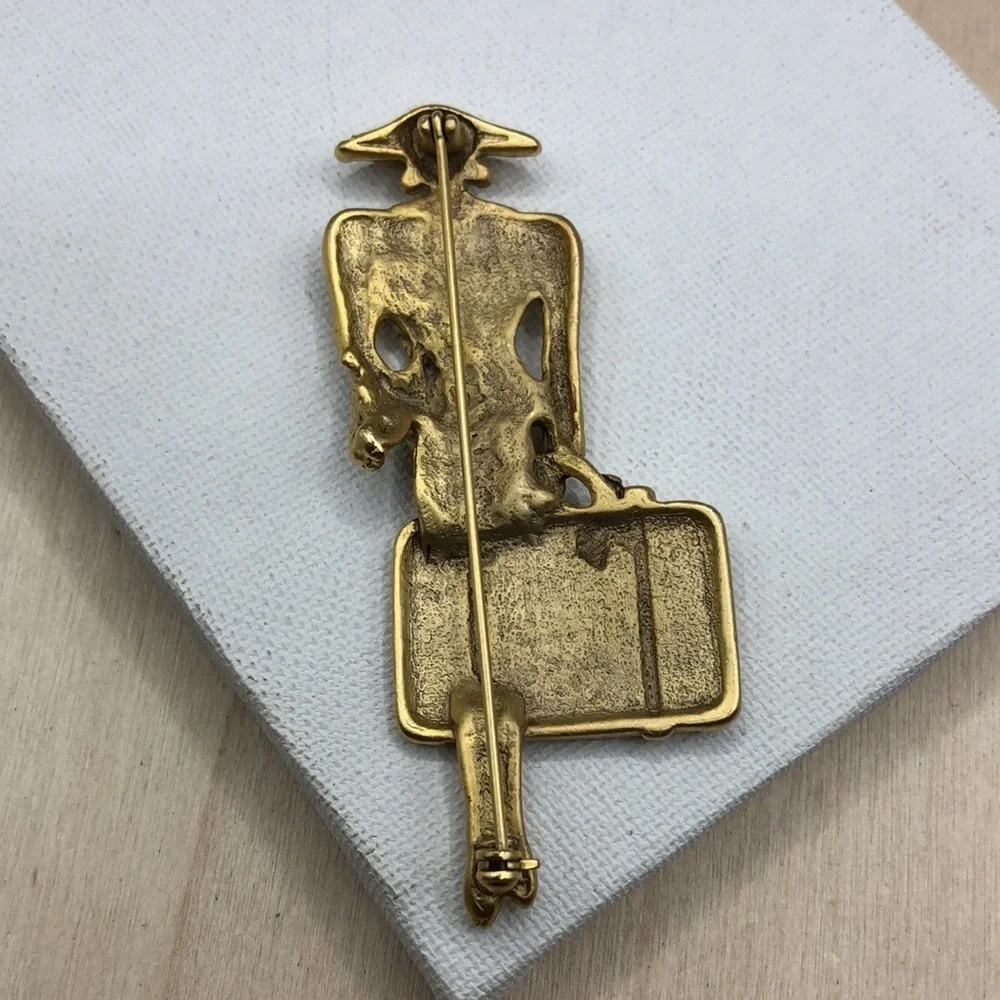 Vintage traveling lady fashionista with small dog brooch statement size
